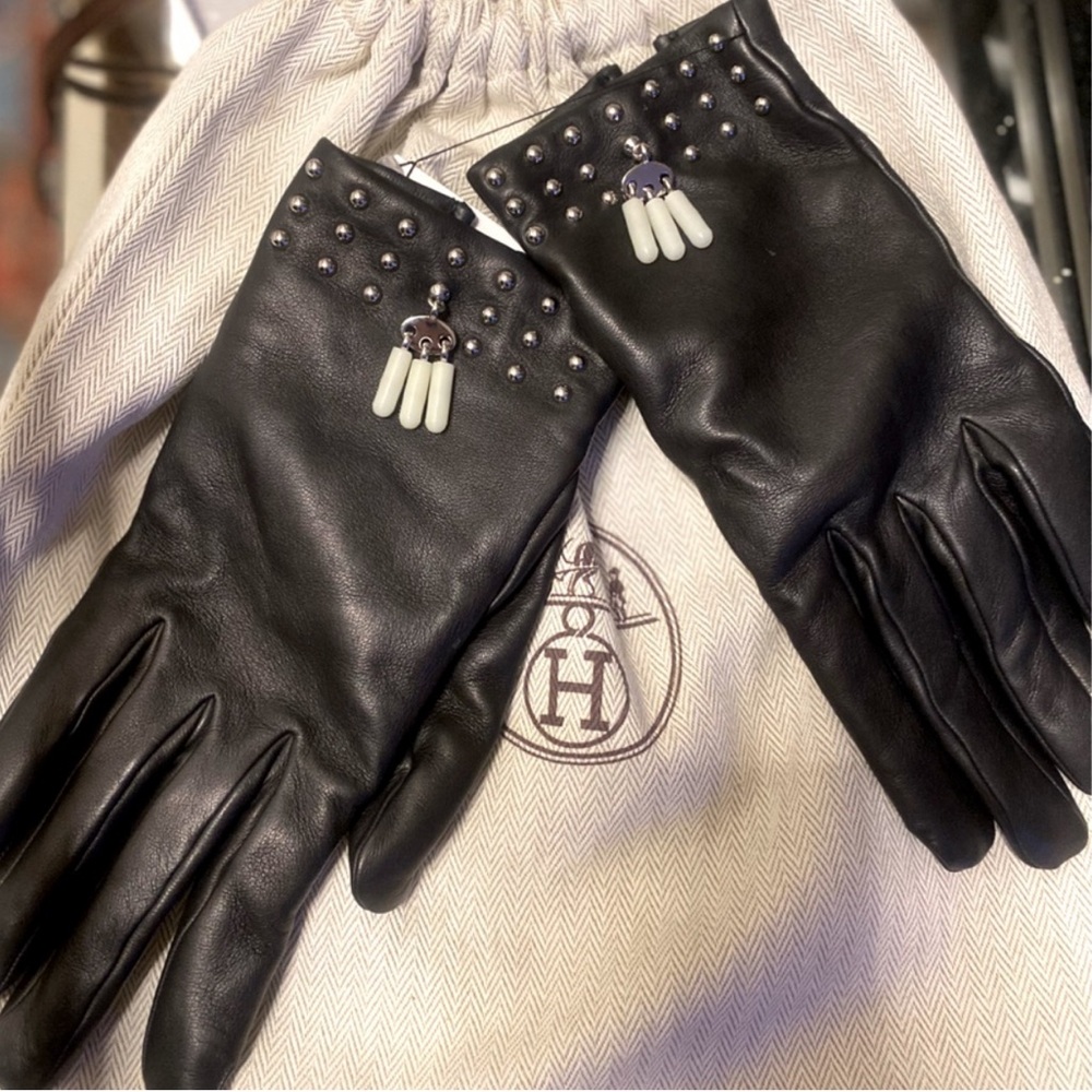 HERMES’ leather gloves with pearls